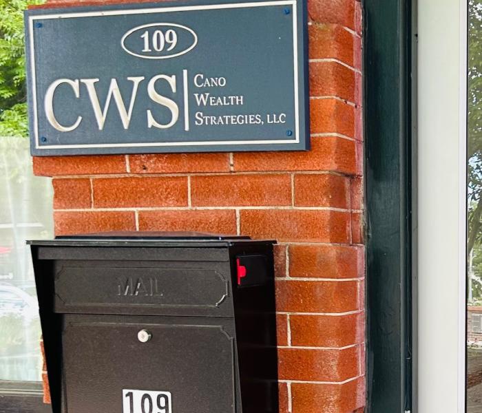 Sign by the door at 109 S. Main Street
