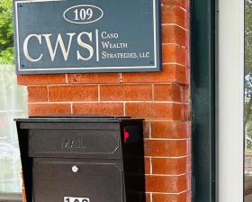 Sign by the door at 109 S. Main Street