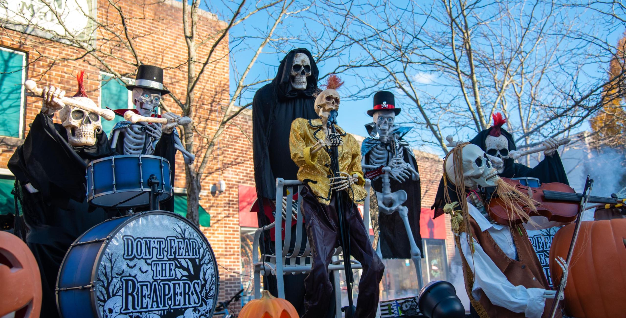 halloween characters staged like a band