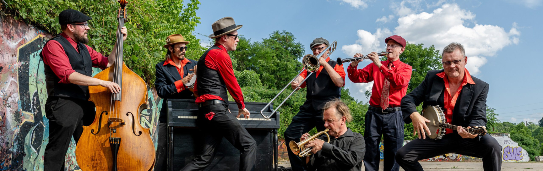 7 band members playing various instruments