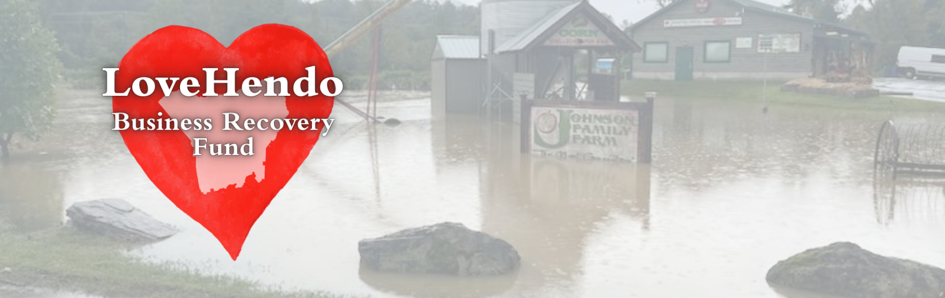 lovehendo logo in front of a flooded business