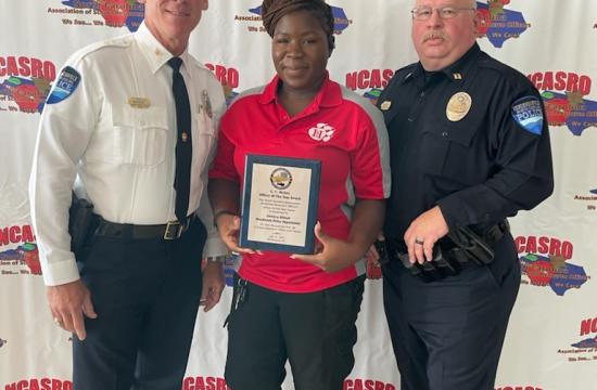 police chief and 2 officers with an award