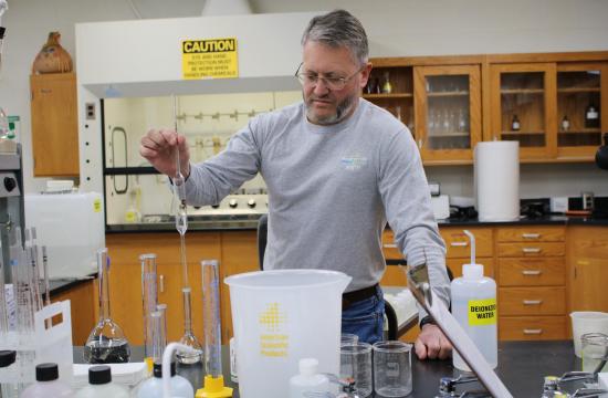 lab supervisor working in a lab