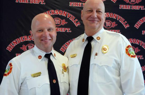 New Chief Ward standing with retiring Chief Miller