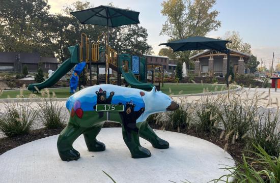 bear statue and playground