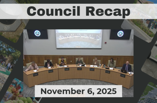 City Council members are seated around a curved dais.