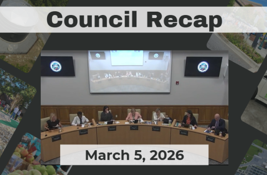 City Council members sit at dais. 