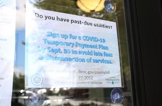 sign on door of City Hall building