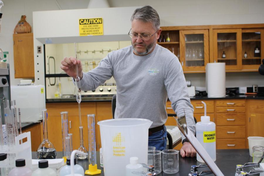 lab supervisor working in a lab