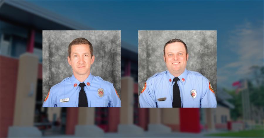 2 firefighters wearing blue uniform shirts and ties