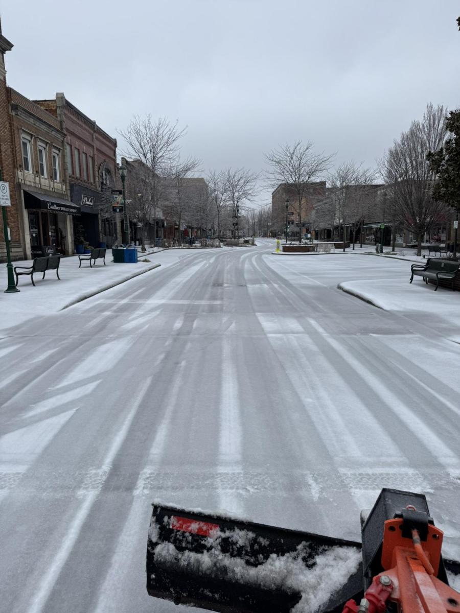 City plowing Main Street during a Winter Storm