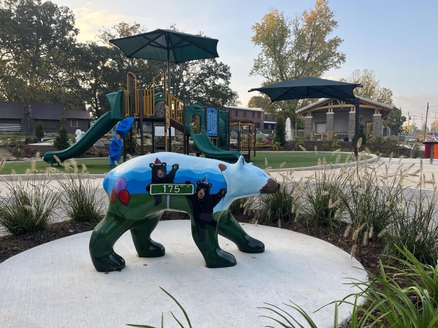 bear statue and playground