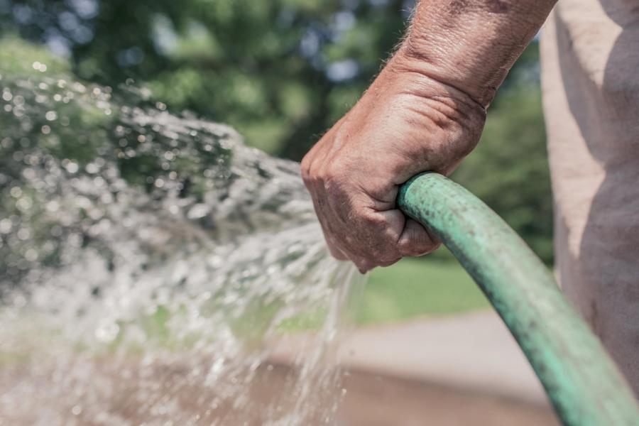 water hose spraying water
