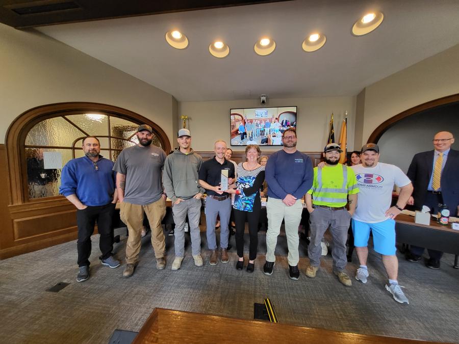Group of Water and Sewer Employees accepting the Environmental Sustainability Hero Award