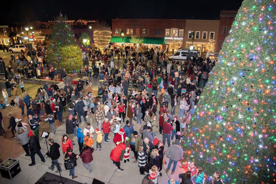 A large crowd celebrates the Tree Lighting 