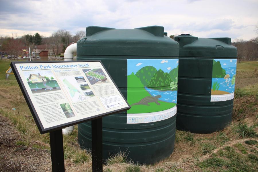 sign and 2 rainwater cisterns