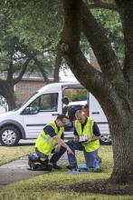 Crew members conducting install