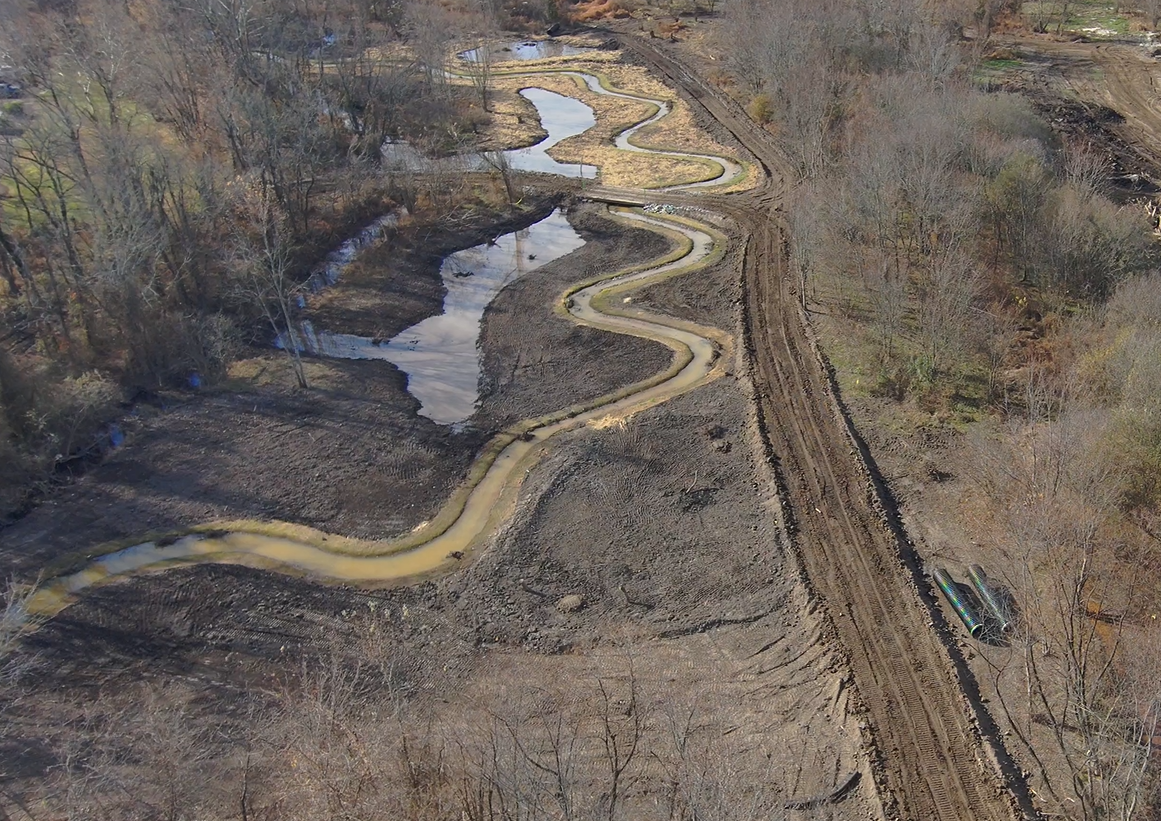 drone image of floodplain restoration project with meandering creek