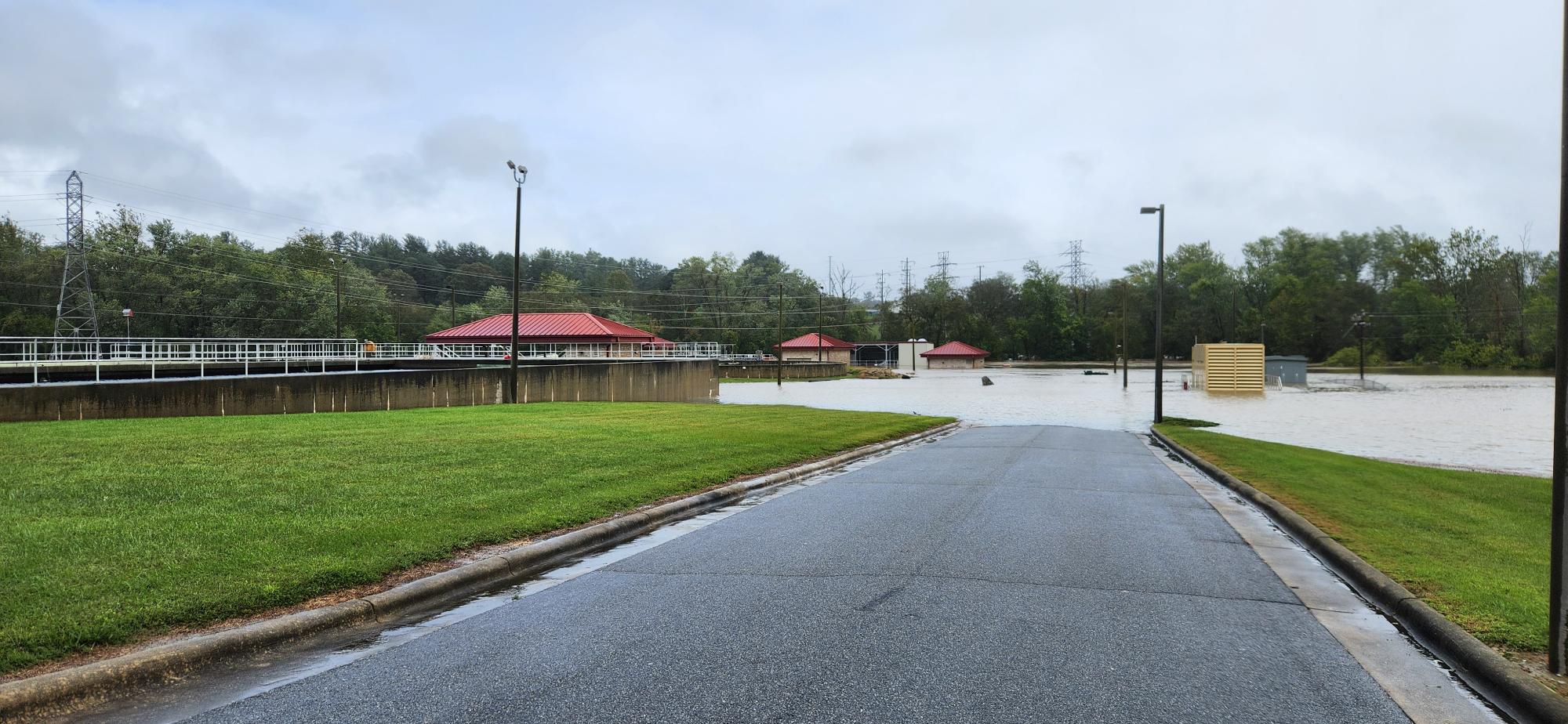 Wastewater plant with floodwaters covering the low-lying buildings following Hurricane Helene