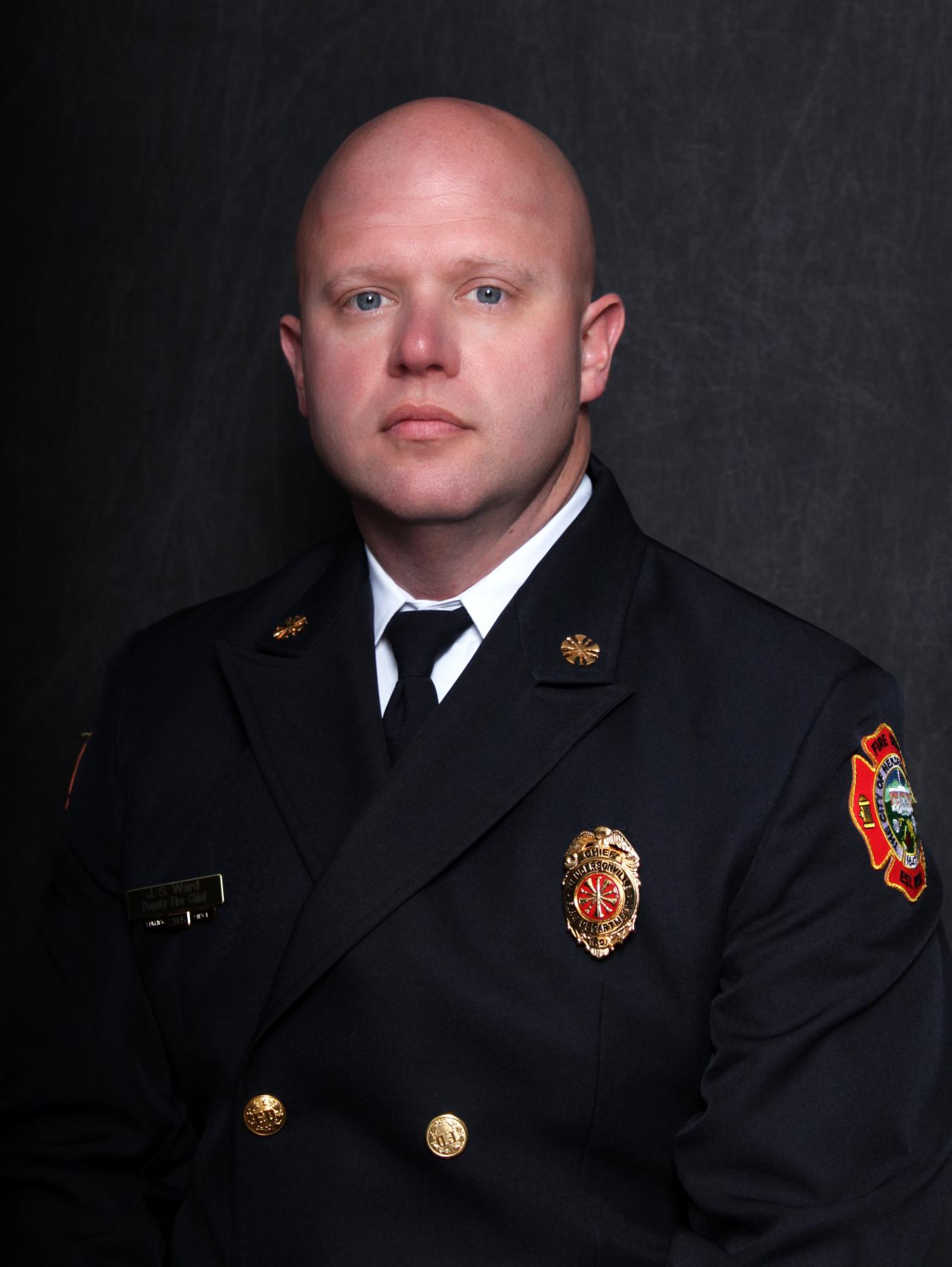 Fire Chief Ward wearing a Class A uniform
