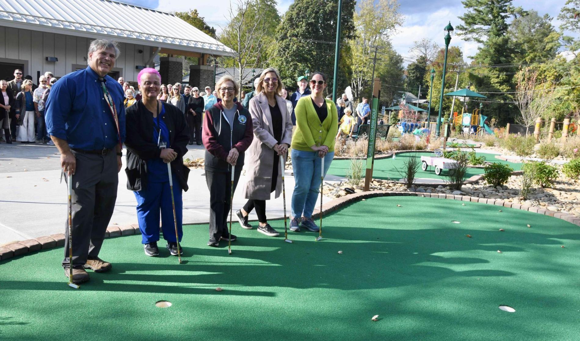 City Council standing on the putting green at the grand opening ceremony
