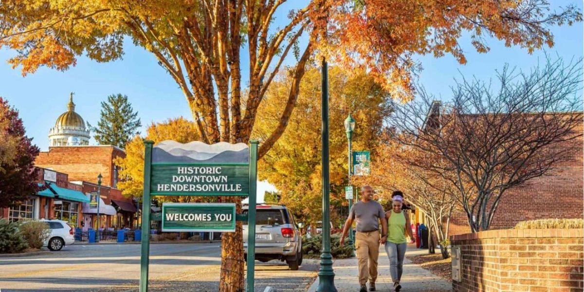 Fall trees in downtown Hendersonville with bright orange and yellow colors