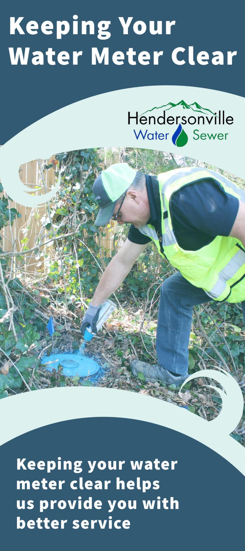 crew member spray painting a water meter