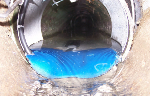 micromonitor takes measurements in a sewer pipe