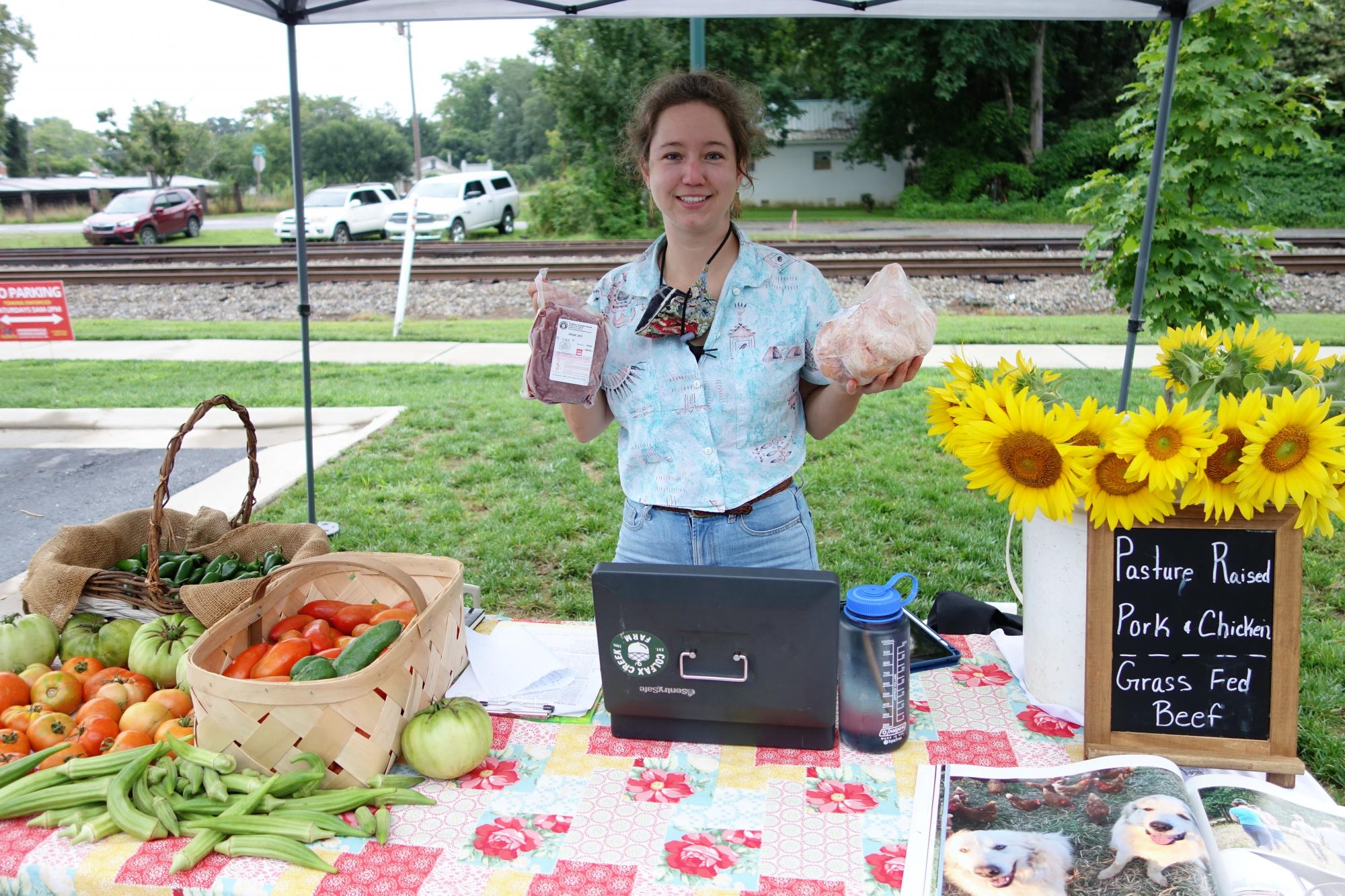 Vendor selling meat and veggies