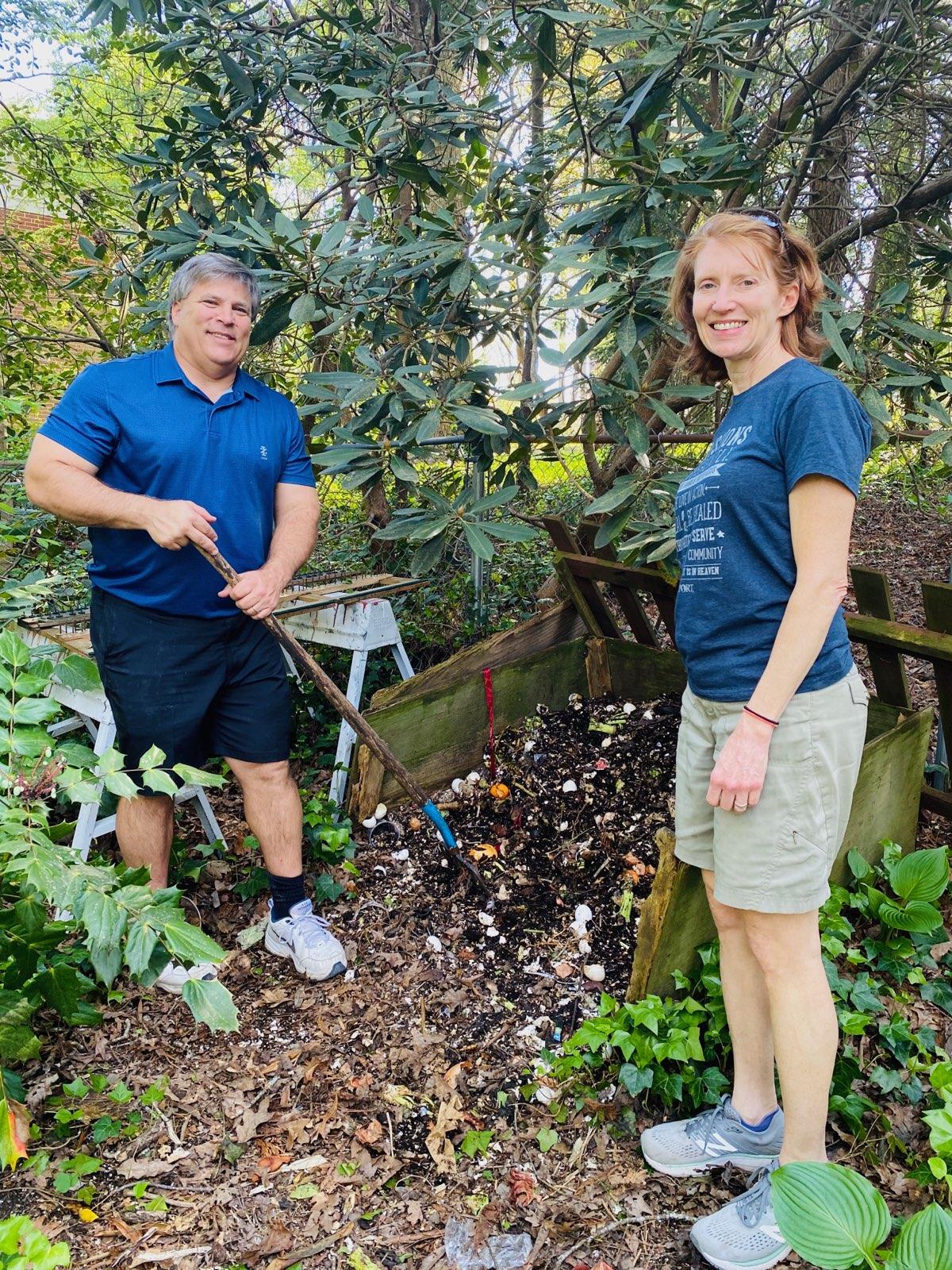 Council Member Smith and wife Anne composting