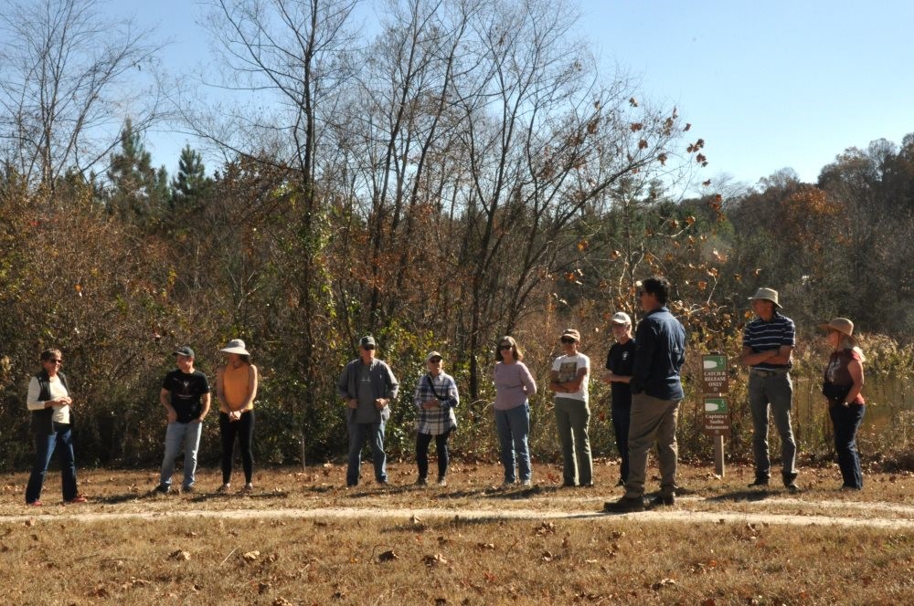 A group of people outside on Greenway